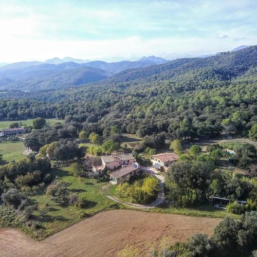 an aerial view of a home in the mountains at Mas Ca La Coixa in Tortellá