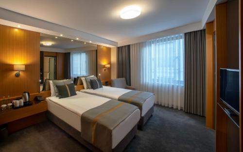 TV a/nebo společenská místnost v ubytování Tan Hotel - Special Category