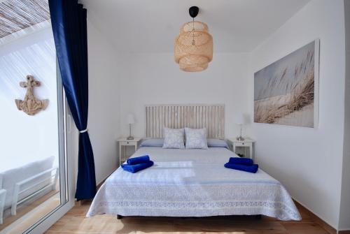 Postel nebo postele na pokoji v ubytování Sky Lovers Jacuzzi Fuerteventura