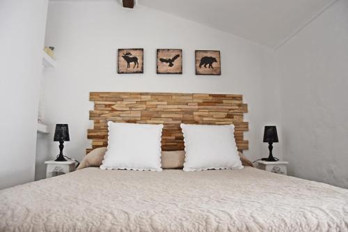 A bed or beds in a room at Casa El Simancón