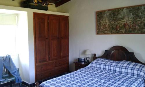 Postel nebo postele na pokoji v ubytování Descanso Reparador