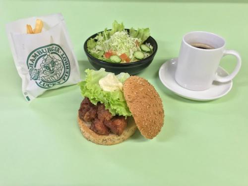 a sandwich and a cup of coffee and a salad at Hotel New Ohte in Hakodate