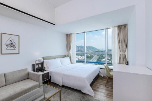 ภาพในคลังภาพของ Golden Central Hotel Serviced Residence-Xin Hao E Du金中环服务公寓新浩e都店 ในเซินเจิ้น