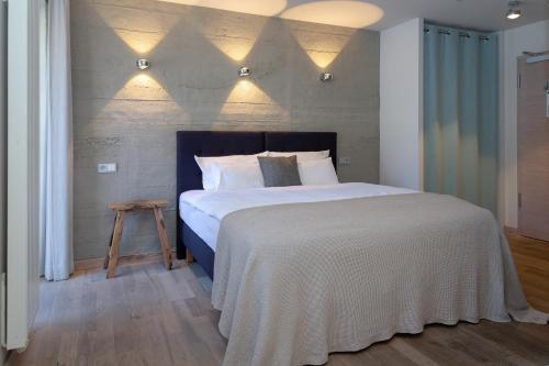 
Ein Bett oder Betten in einem Zimmer der Unterkunft Hotel Luise-Luisenhof
