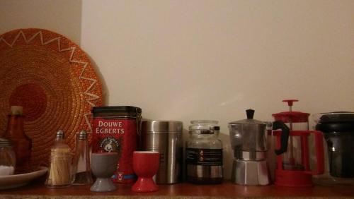 a counter top with a bunch of items on it at CHRYSSA - ΧΡΥΣΑ in Patra