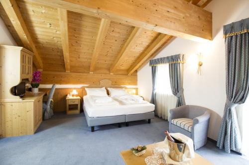 Кровать или кровати в номере Hotel Casa del Campo