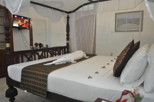 Кровать или кровати в номере Villa 80