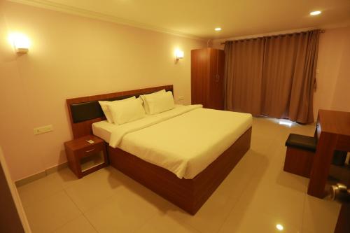 Ein Bett oder Betten in einem Zimmer der Unterkunft Luxora Hotel and Spa