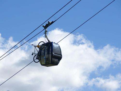 a person on a ski lift in the sky at Chalet in La Norma near Ski Lift in Villarodin-Bourget