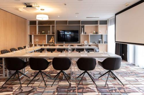 TV a/nebo společenská místnost v ubytování Best Western Plus Europe Hôtel Brest