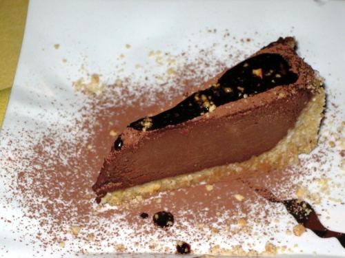 a piece of chocolate pie on a white plate at The Champs in Portsmouth