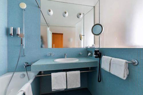 Ett badrum på Hotel Cornavin
