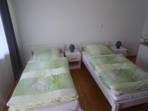 Postel nebo postele na pokoji v ubytování Monteurwohnung Hammel