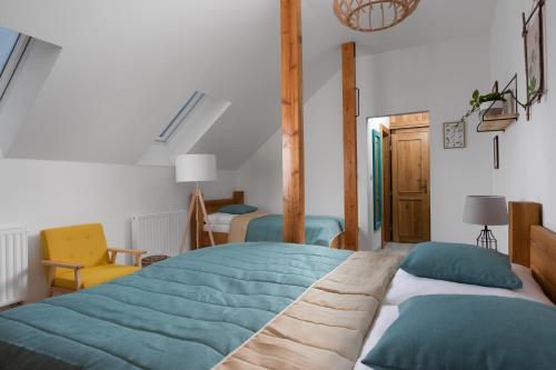 Posteľ alebo postele v izbe v ubytovaní BURINA plant-based residence