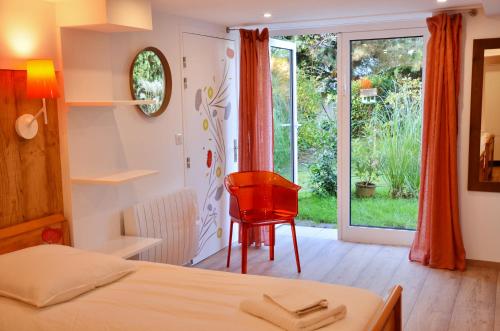 Ένα ή περισσότερα κρεβάτια σε δωμάτιο στο Embassy Corner