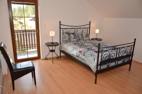 Ένα ή περισσότερα κρεβάτια σε δωμάτιο στο Villa Lipno Lake