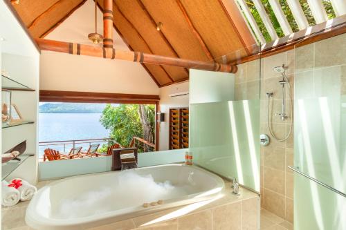 A bathroom at Royal Davui Island Resort, Fiji - Adults Only