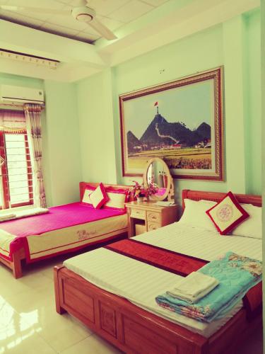 Ένα ή περισσότερα κρεβάτια σε δωμάτιο στο Thien An Guest House