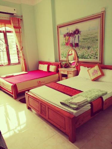 Ένα ή περισσότερα κρεβάτια σε δωμάτιο στο Thien An Guest House