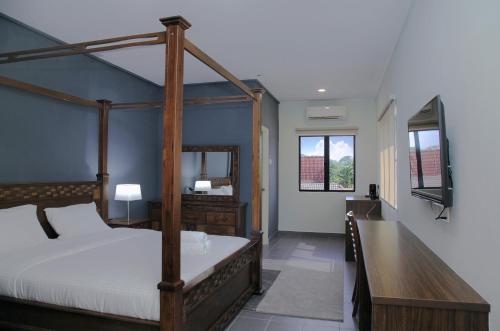 Un pat sau paturi într-o cameră la Hotel ali Imran
