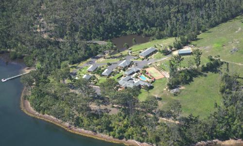 a large body of water surrounded by trees at Robyns Nest in Merimbula
