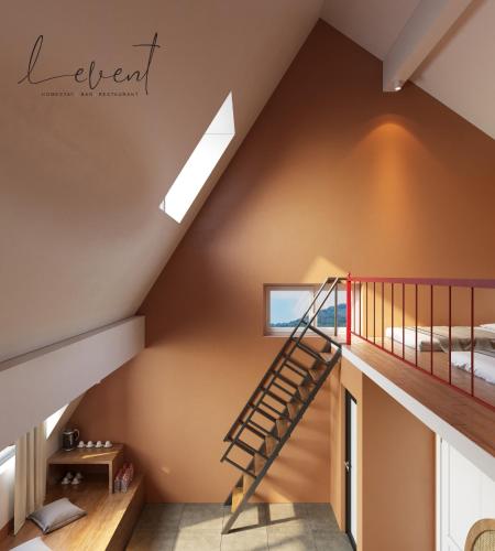 a staircase in the attic of a house at Le vent Tam Đảo homestay in Tam Ðảo
