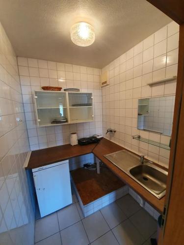 
A kitchen or kitchenette at Bräuhaus Appartement
