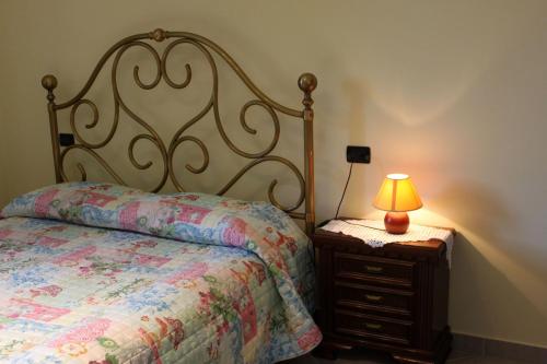Postel nebo postele na pokoji v ubytování Bed and Breakfast Emilia