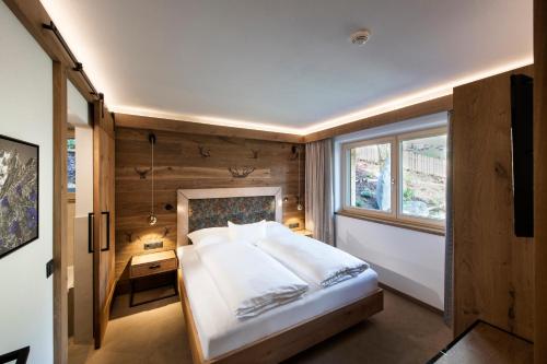 Postelja oz. postelje v sobi nastanitve Chalet´s Alpenjuwel