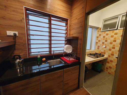Kuchyň nebo kuchyňský kout v ubytování Quintet Residence
