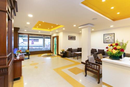 a lobby of a hospital with a waiting room at Le Celestium in Munnar