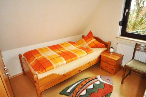 Postel nebo postele na pokoji v ubytování Ferienwohnung An der Wieke, 65295