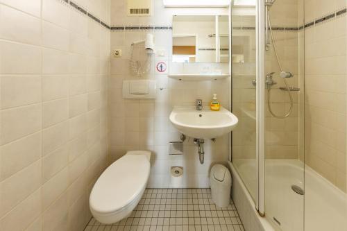 Phòng tắm tại City-Pension Dessau-Roßlau