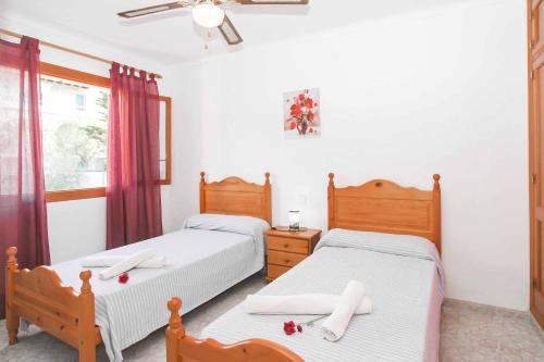 Postel nebo postele na pokoji v ubytování Villa Punta des Port Catorce