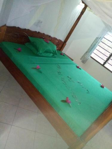Postel nebo postele na pokoji v ubytování Casa da Luna Watamu Kenya