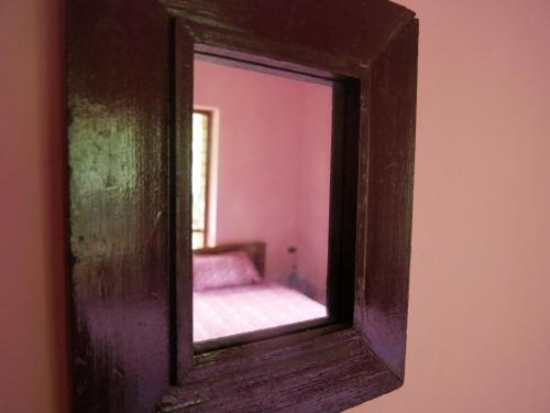 Ένα ή περισσότερα κρεβάτια σε δωμάτιο στο Padmini House