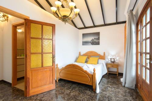 Ένα ή περισσότερα κρεβάτια σε δωμάτιο στο Villa Las Calderetas