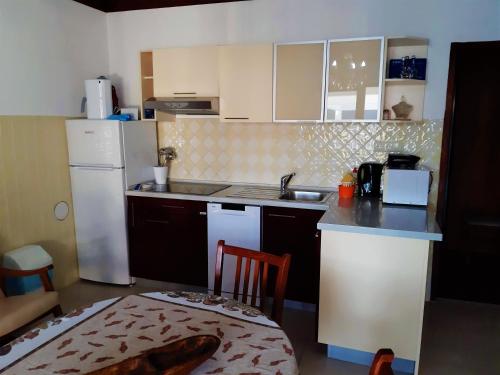 Dapur atau dapur kecil di Guesthouse Raffaello