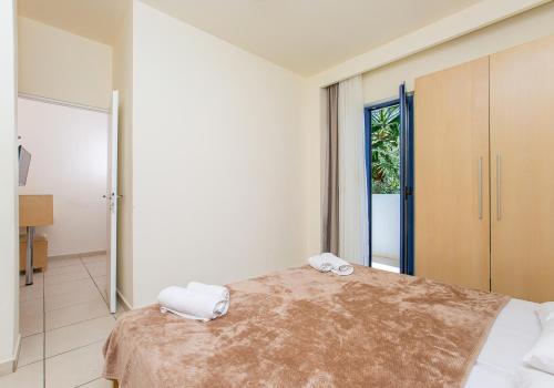 Cama o camas de una habitación en Hermes Hotel