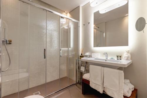 Ένα μπάνιο στο Singer Palace Hotel Roma