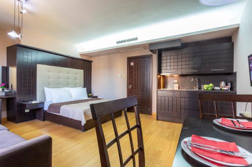 Η κουζίνα ή μικρή κουζίνα στο CityHome Aparthotel