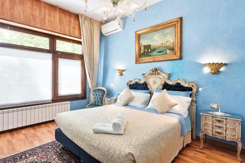 Postel nebo postele na pokoji v ubytování BB Venezia