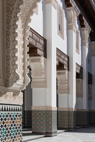 an arch in a building with mosaics on the floor at The Oberoi Marrakech in Marrakech