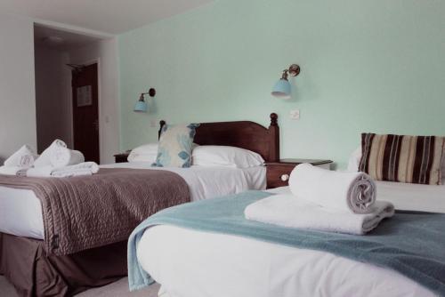 Postel nebo postele na pokoji v ubytování Mullions 51 B&B