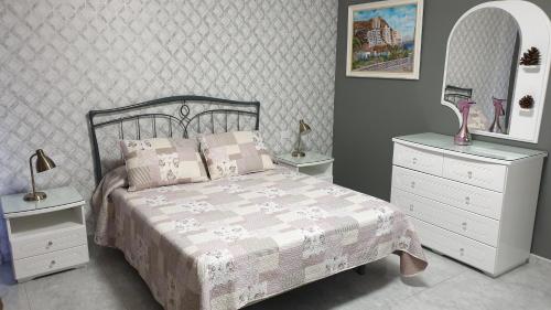 Posteľ alebo postele v izbe v ubytovaní CanariasBrisaMar - Apartamento