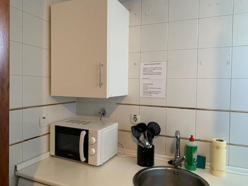 A kitchen or kitchenette at Apartamentos Torr en Madrid - Chamartín