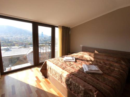 Ένα ή περισσότερα κρεβάτια σε δωμάτιο στο ANAs House