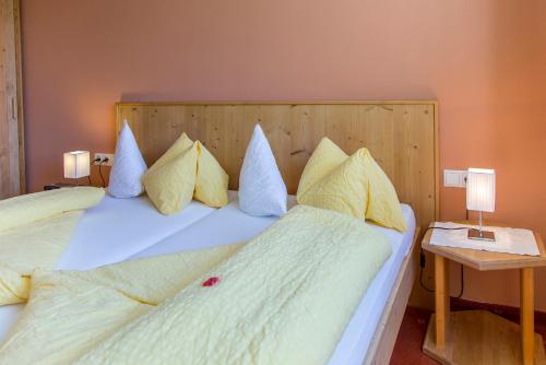 Ein Bett oder Betten in einem Zimmer der Unterkunft Haus La Chiesa