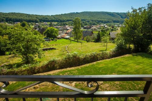 a view of a park from a bench at Gîte le Haut Rivage in Tournavaux
