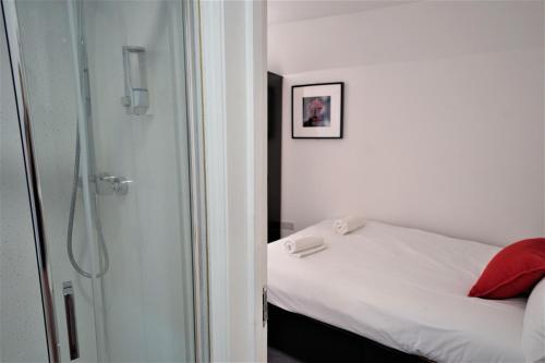 Postel nebo postele na pokoji v ubytování TBH Hotel